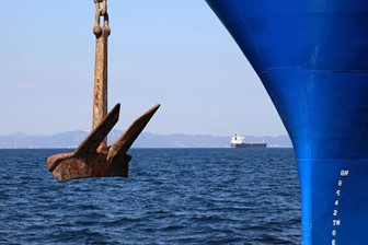 Drag Embedment Anchor showcased on a shipping vessel.